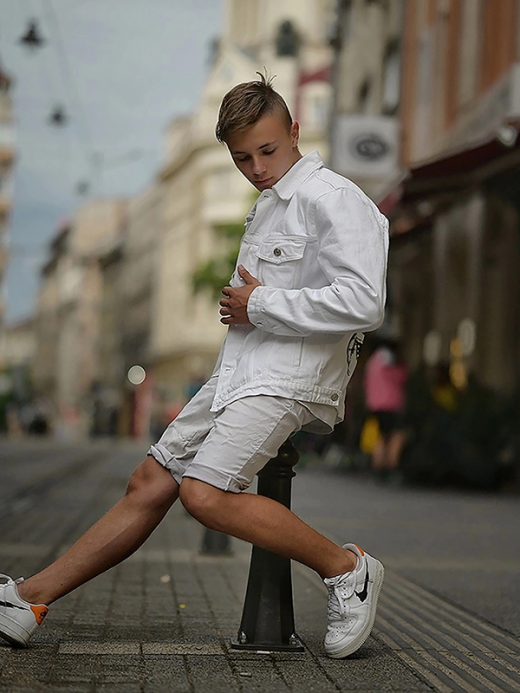Stylе boy in white denim clothes